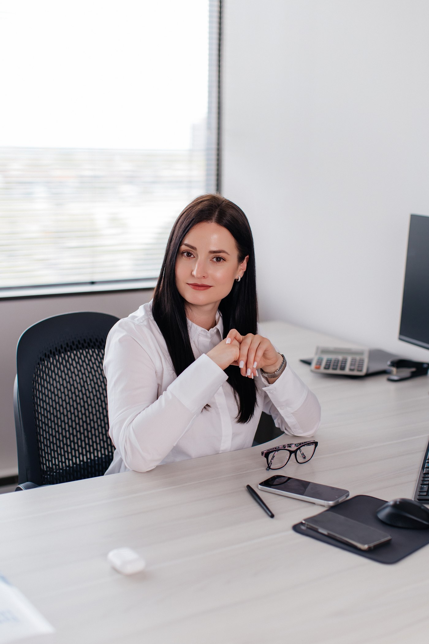 Iryna Borisikova working at her desk